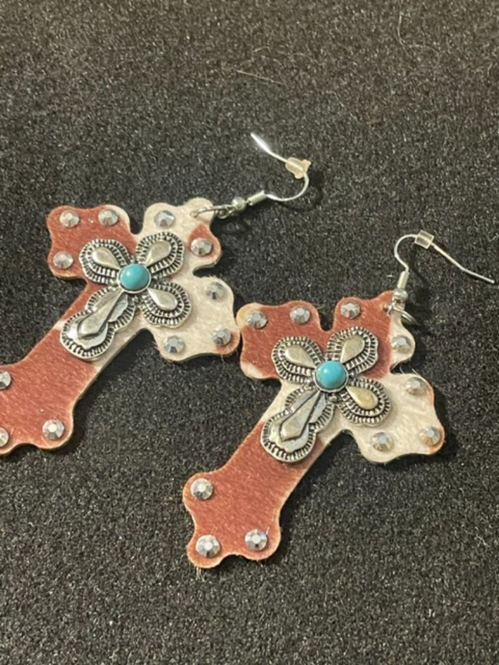 Cow print and faux turqoise cross hook earrings, excellent condition!